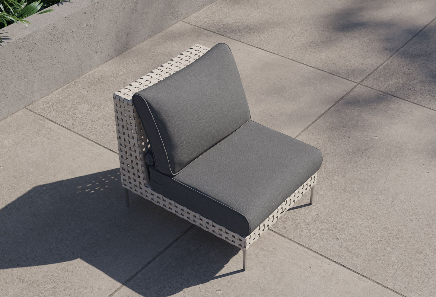 Chaise d'extérieur sans accoudoirs en osier tressé ajouré