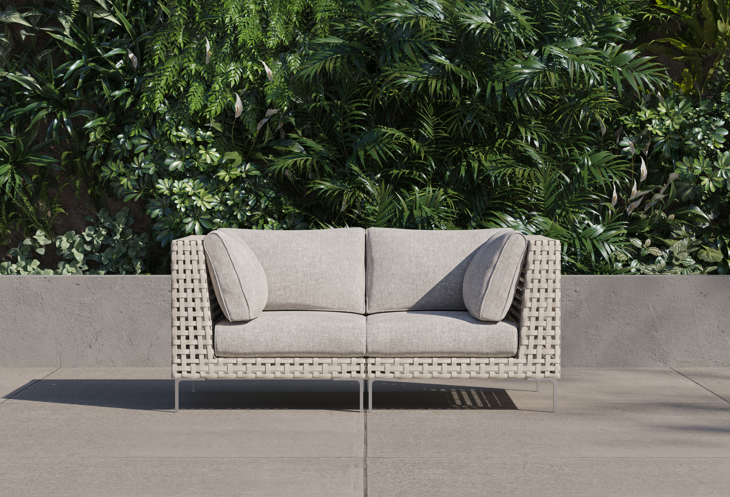 Canapé deux places d'extérieur en osier à tissage ajouré